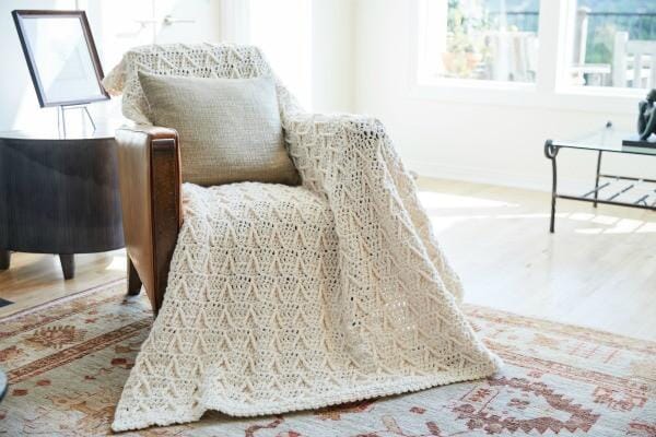 Cozy Winter Stitching: Crochet the Snow Capped Throw